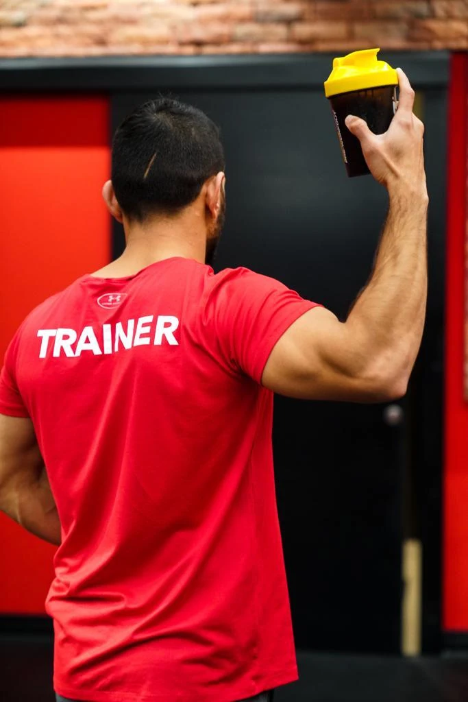 Adeem demonstrating a kettlebell exercise