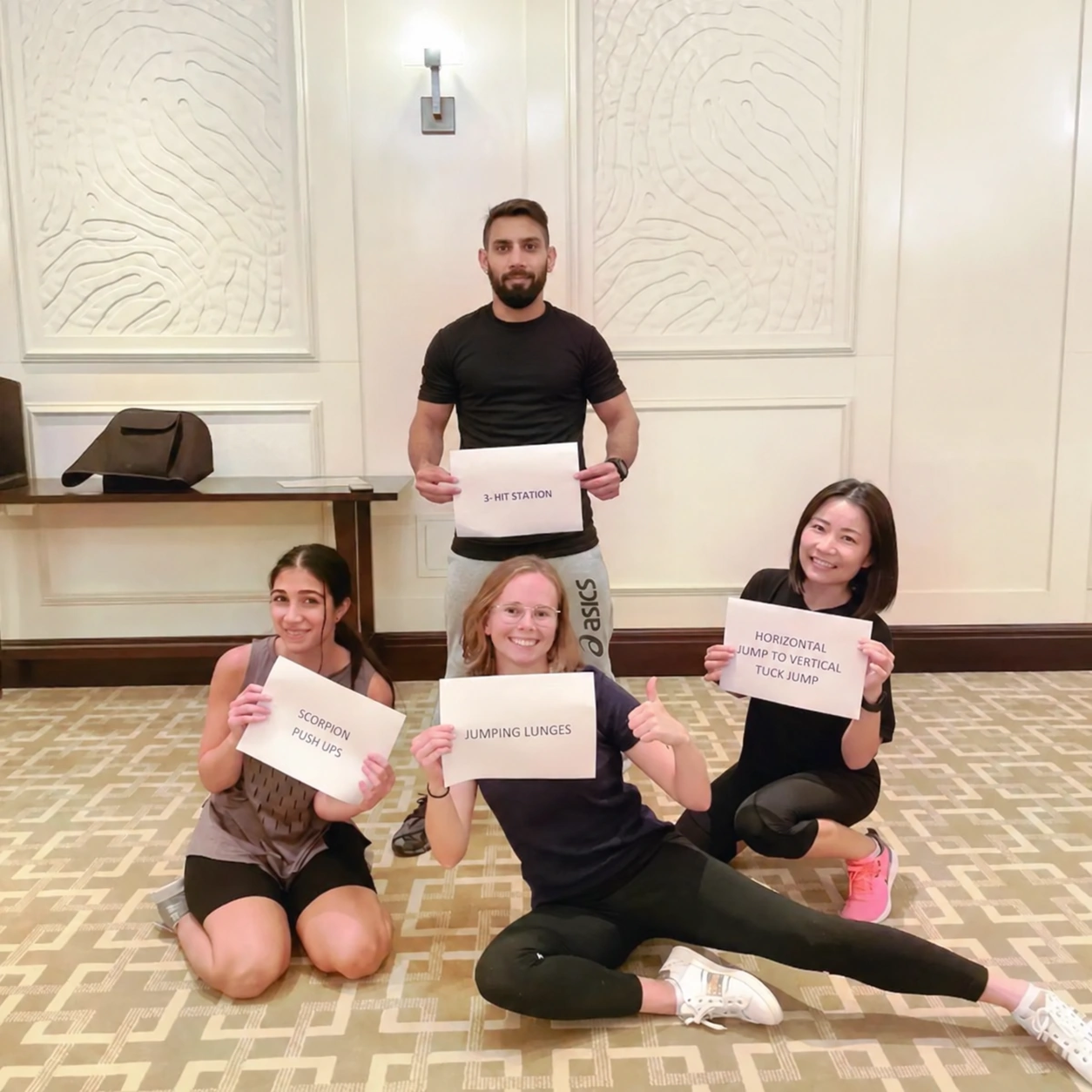 Adeem with participants at a group fitness session
